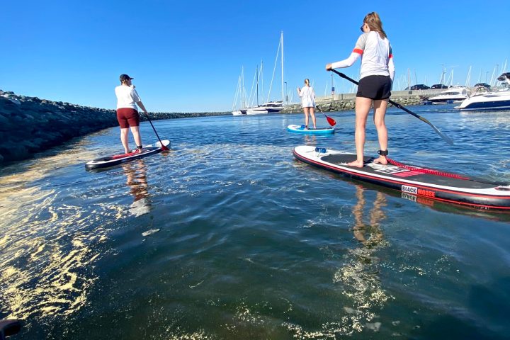 a man riding a wave on a surfboard in the water