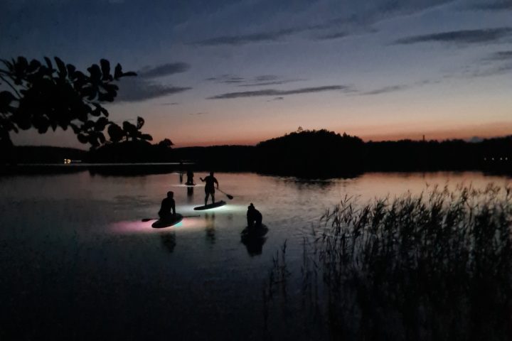 a group of clouds in the sky over a body of water