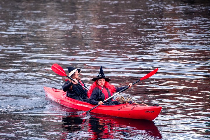 a small boat in a body of water