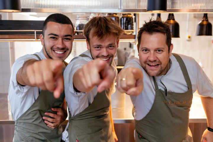 a couple of people posing for the camera